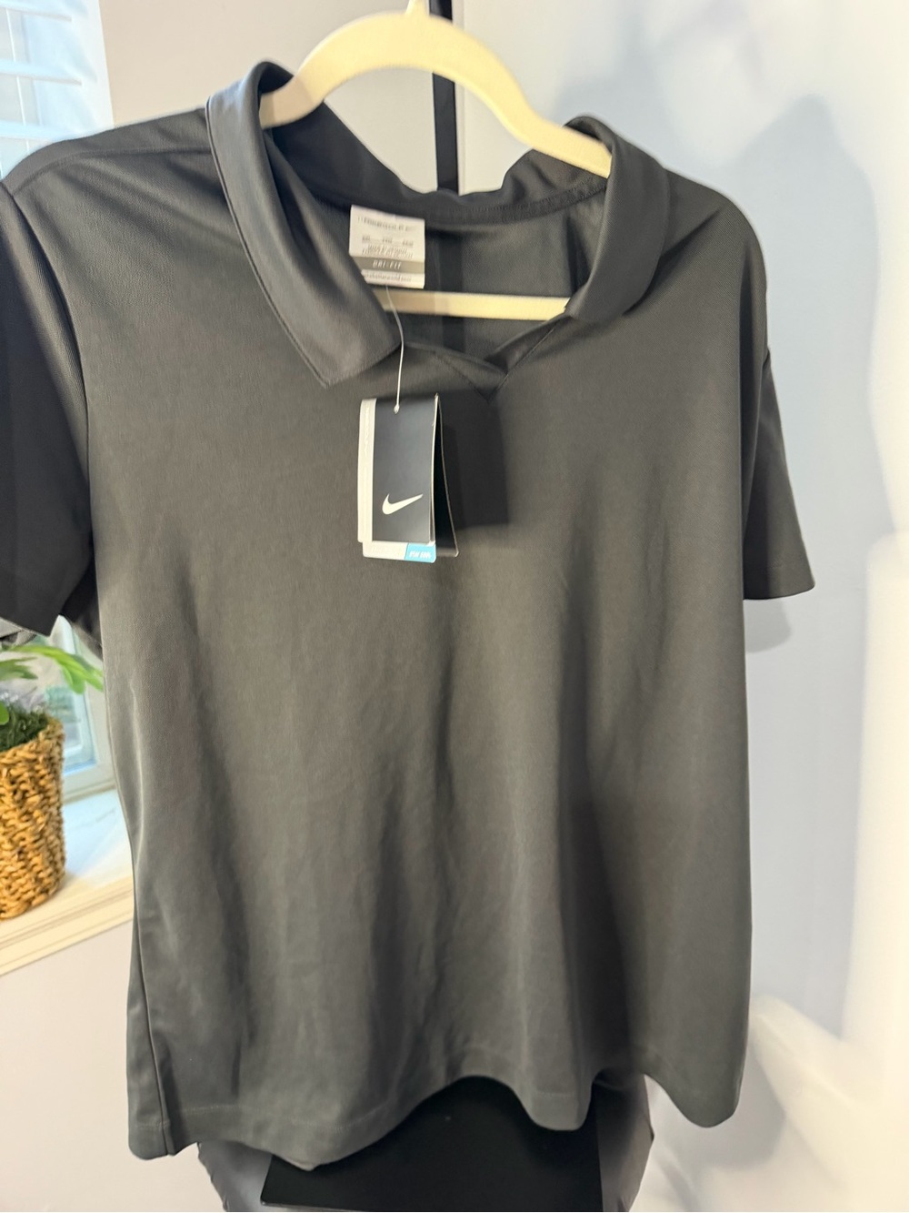 Nike Women's Black Short-Sleeve Polo Tee with V-Notch Collar